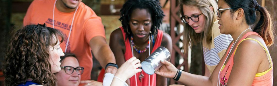 Five professionals engaging in hands-on, arts-integrated professional learning